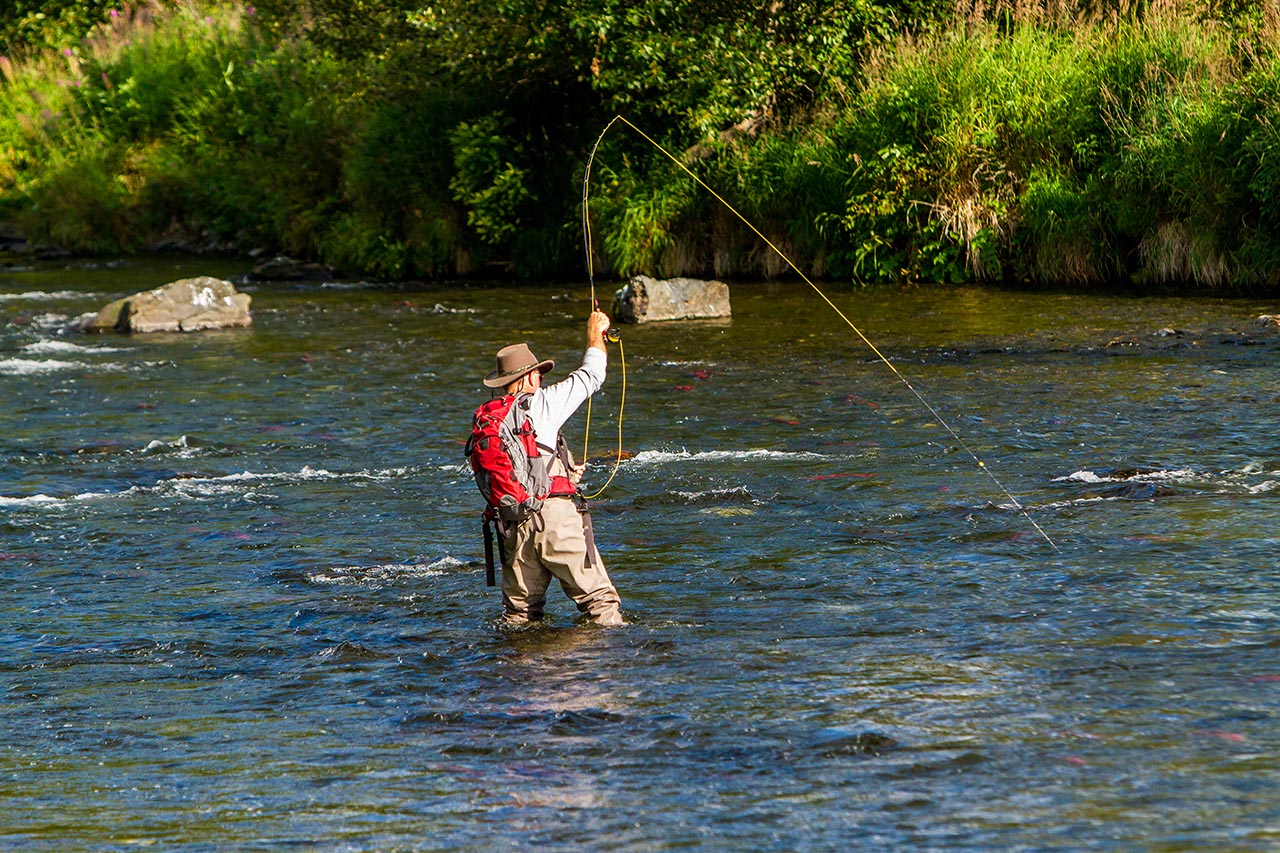 Man fly fishing in the river.